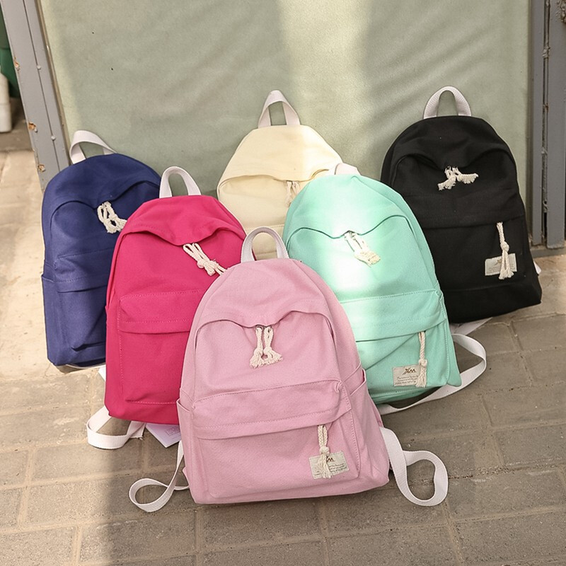 騰彩日韓潮流純色簡約帆布雙肩包休閑旅行包男女學(xué)院風(fēng)書包學(xué)生背E1 藏藍色